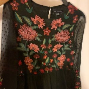 Floral, long-sleeved blouse.